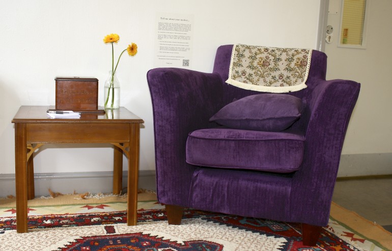 Box and purple chair